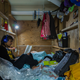 Image for article titled Photos: Tokyo travelers get comfortable in the tiniest of spaces